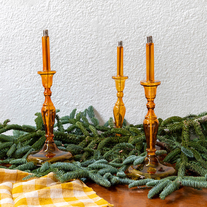 Candelabro de aceite ámbar