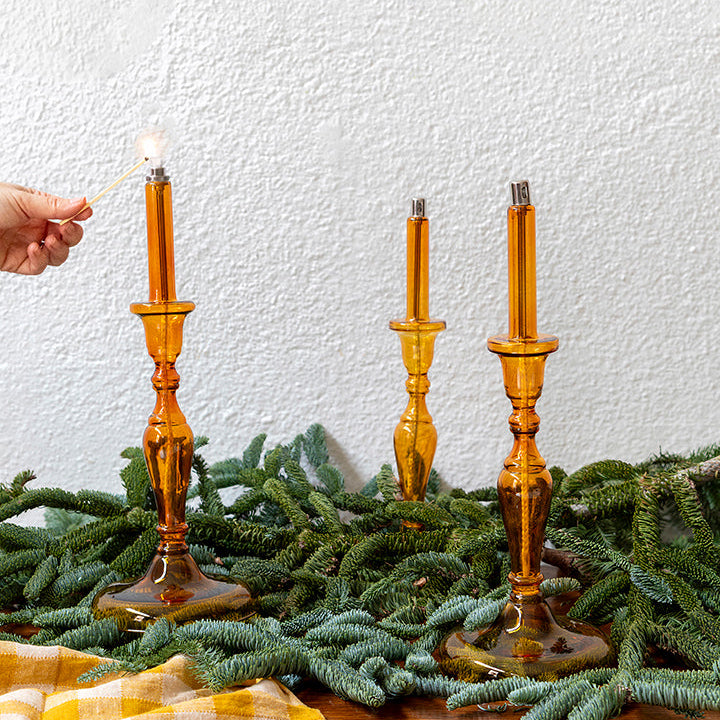 Candelabro de aceite ámbar