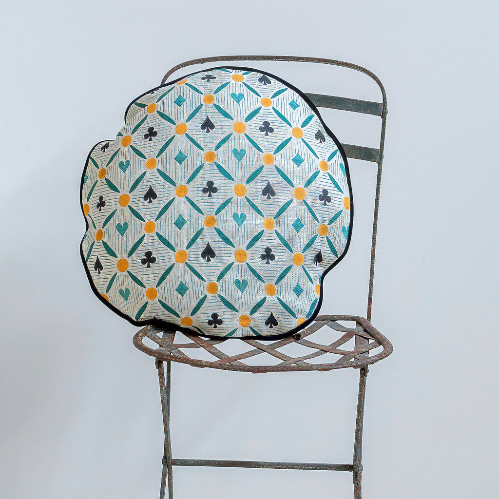 Cojín circular de naipes y rayas verde