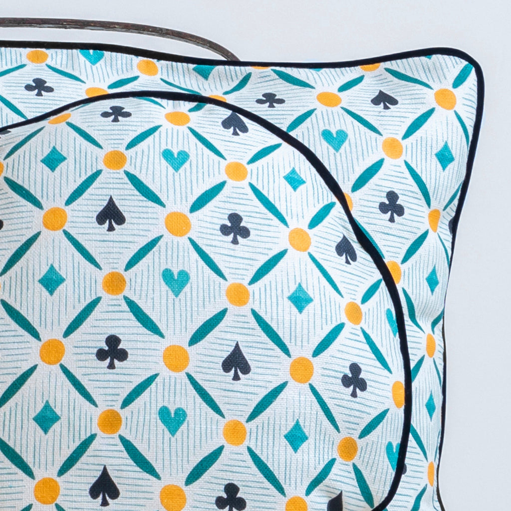 Cojín circular de naipes y rayas verde