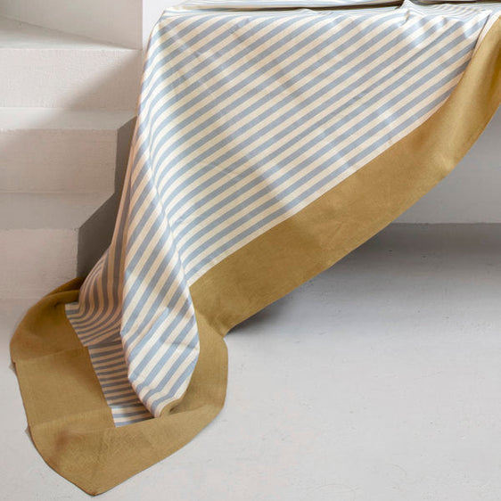 Mantel de algodón resinado 'Bauhaus' con rayas azul y cenefa curry