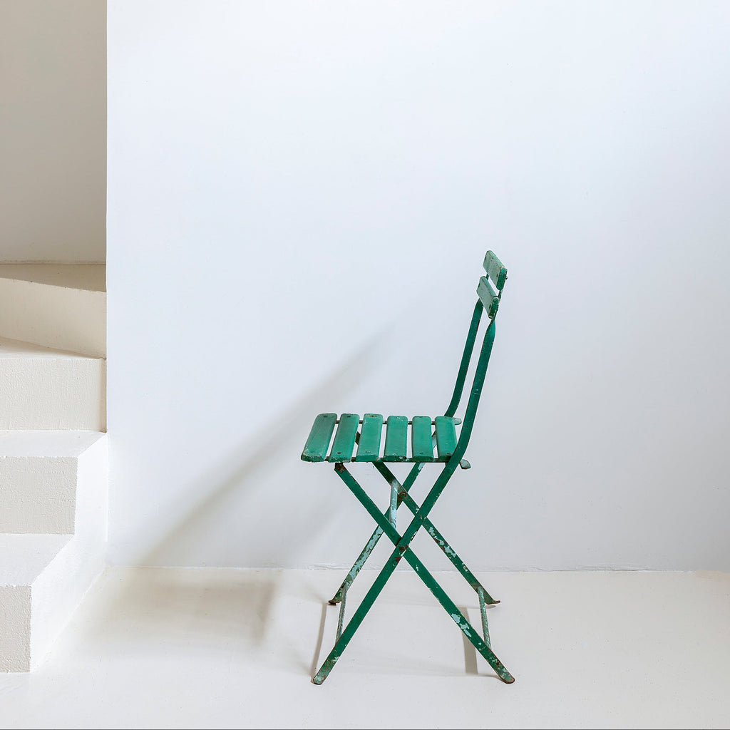 Silla de jardín en hierro patinado verde oscuro