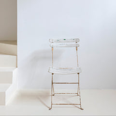Silla de jardín en hierro patinado blanco