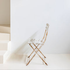 Silla de jardín en hierro patinado blanco