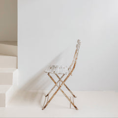 Silla plegable francesa de jardín en hierro patinado blanco