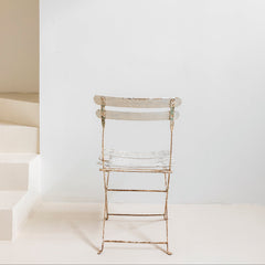 Silla plegable francesa de jardín en hierro patinado blanco