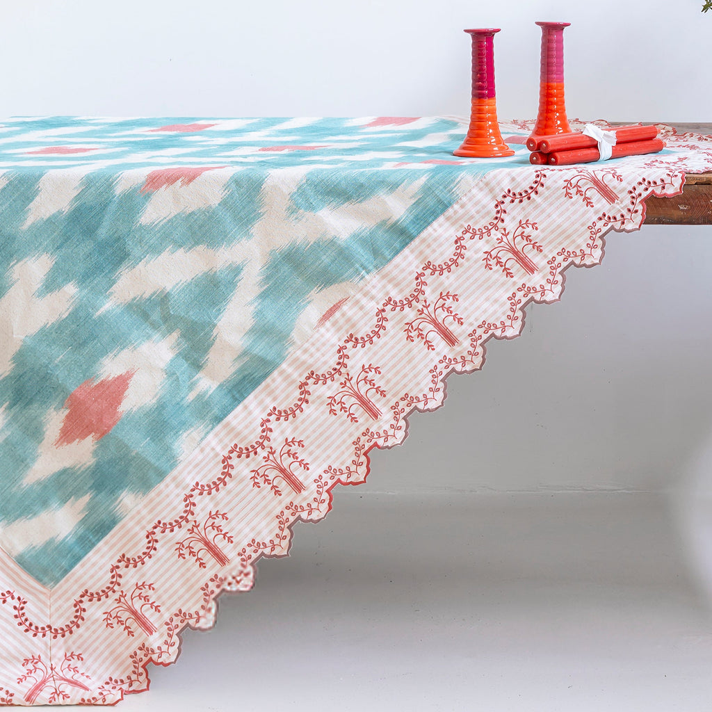 Mantel Ikat turquesa y rosa con cenefa bordada
