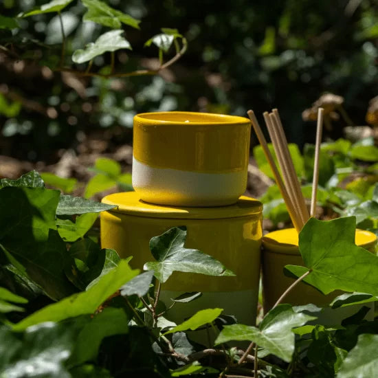 Vela artesanal amarilla olor a cítricos